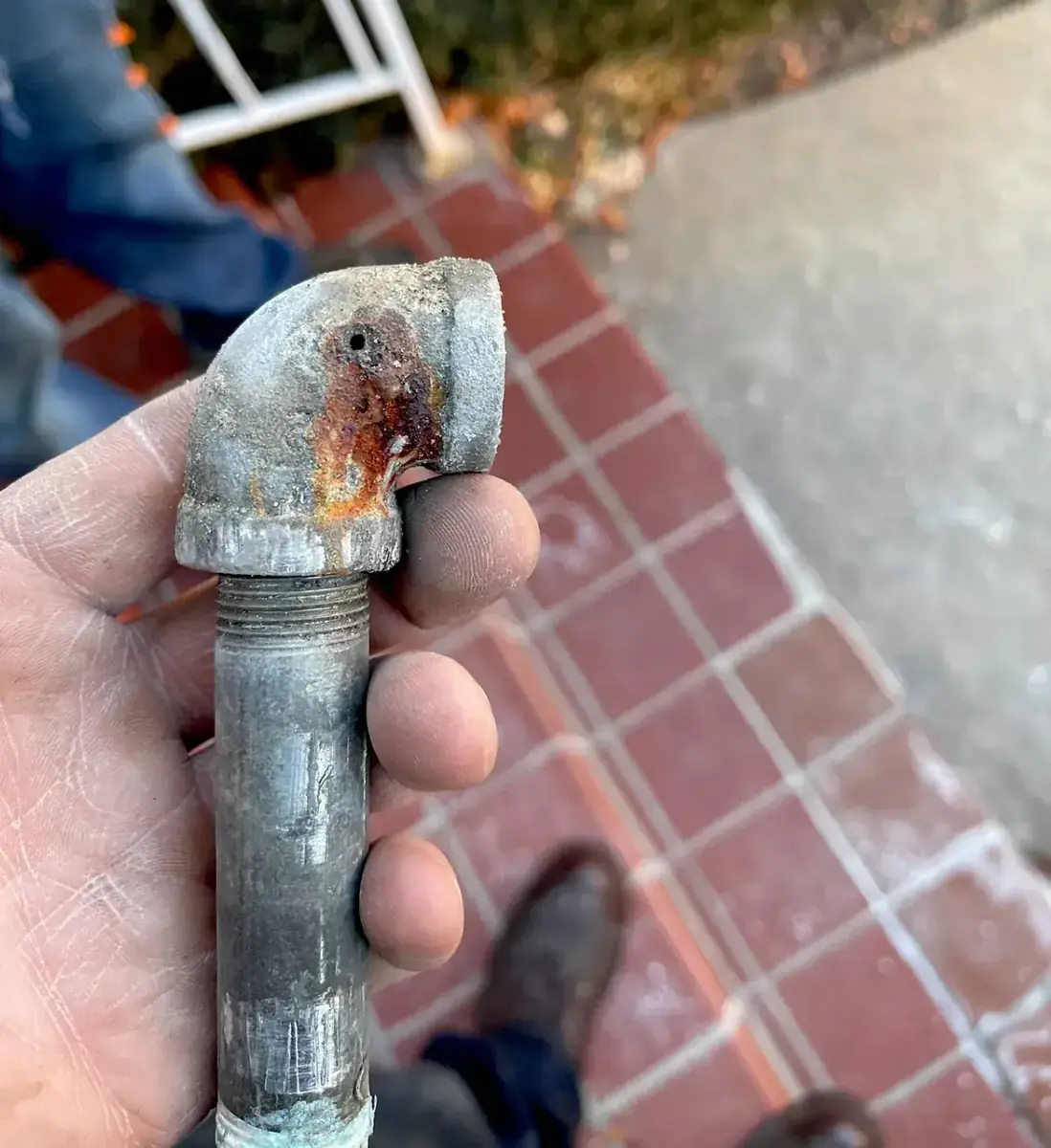 Pinhole Leak Found: Galvanized Elbow